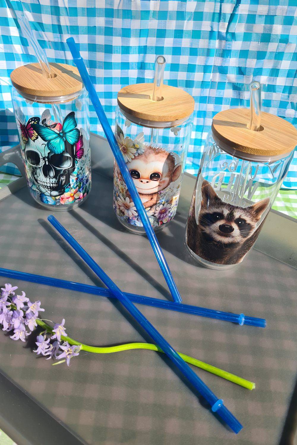 a group of blue and white tooth brushes on a table 