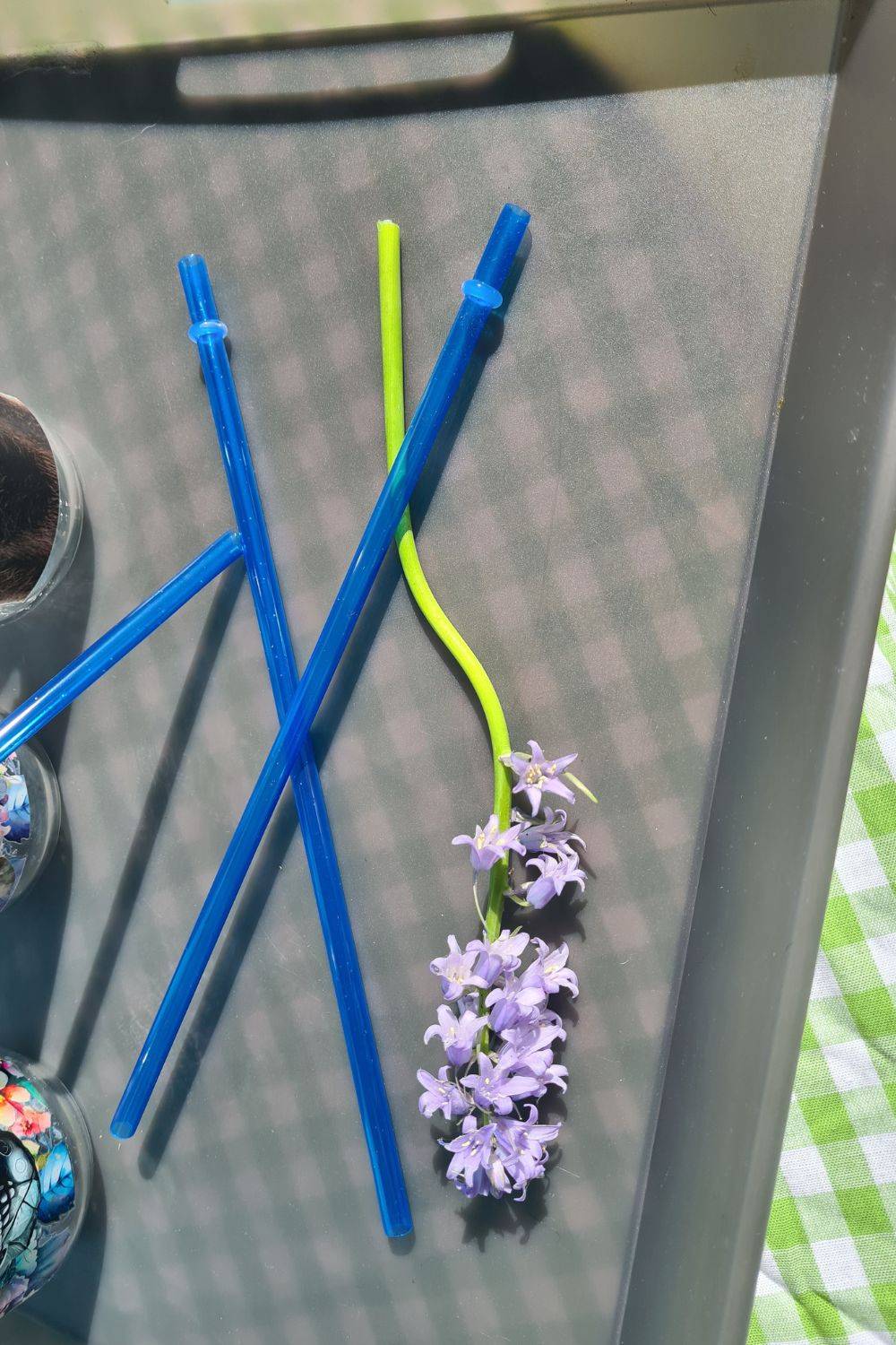 a close up of a toothbrush in a vase 