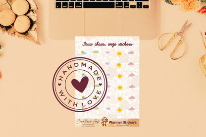 Planner stickers “Weer Icons” in herfstkleuren 🌦🍂✨ – met zon, wolken en regen icoontjes. Handgemaakt design van Creatieve Aap, verkrijgbaar in A6 en A5 formaat, matte of glans afwerking.